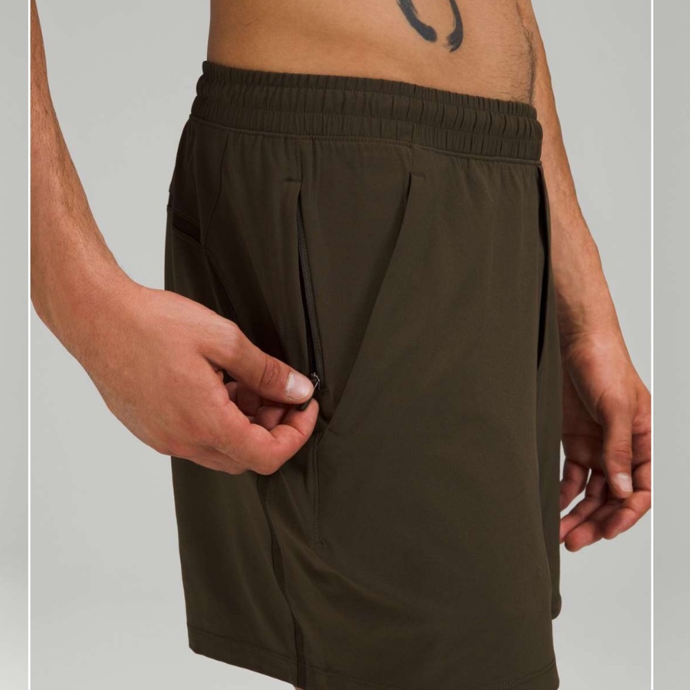 Lululemon Pace Breaker Linerless Short 5” in Dark Olive (size: Medium)